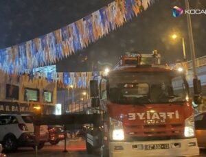 Devletin itfaiye aracıyla AKP bayrakları astılar